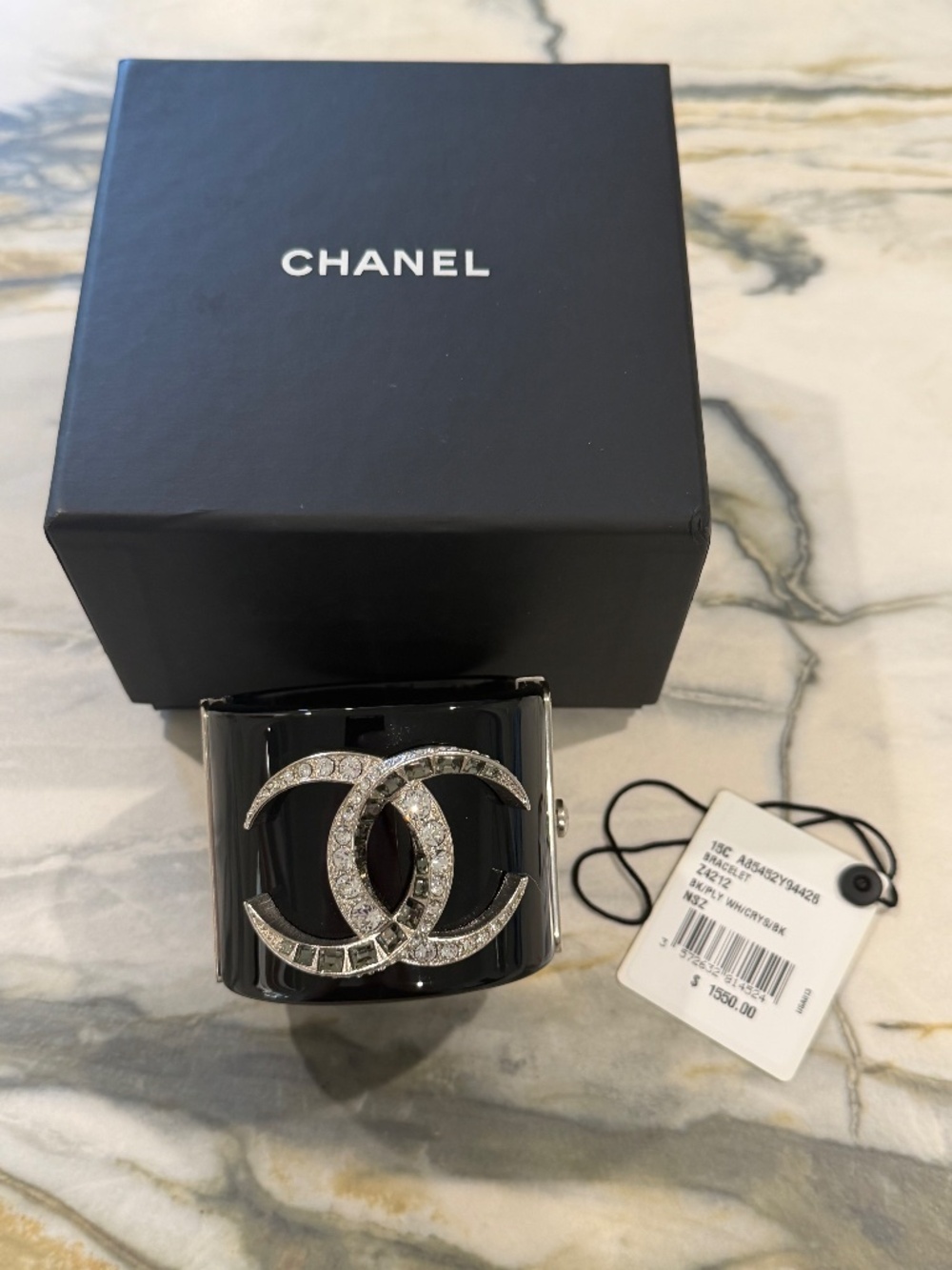 Chanel Black Resin wide cuff bracelet with interlocking CC crystal logo